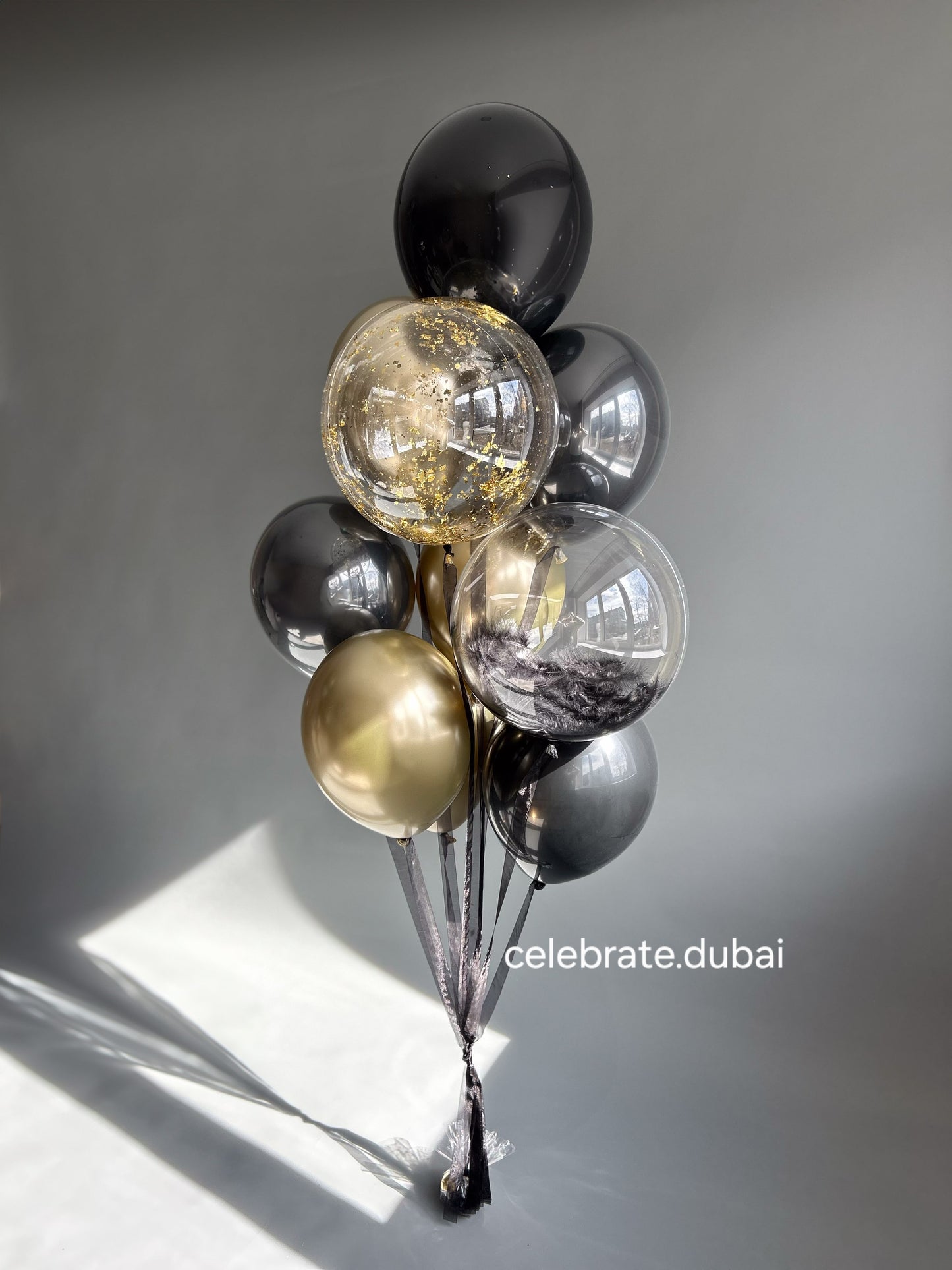 Balloon Arrangement In Black And Gold