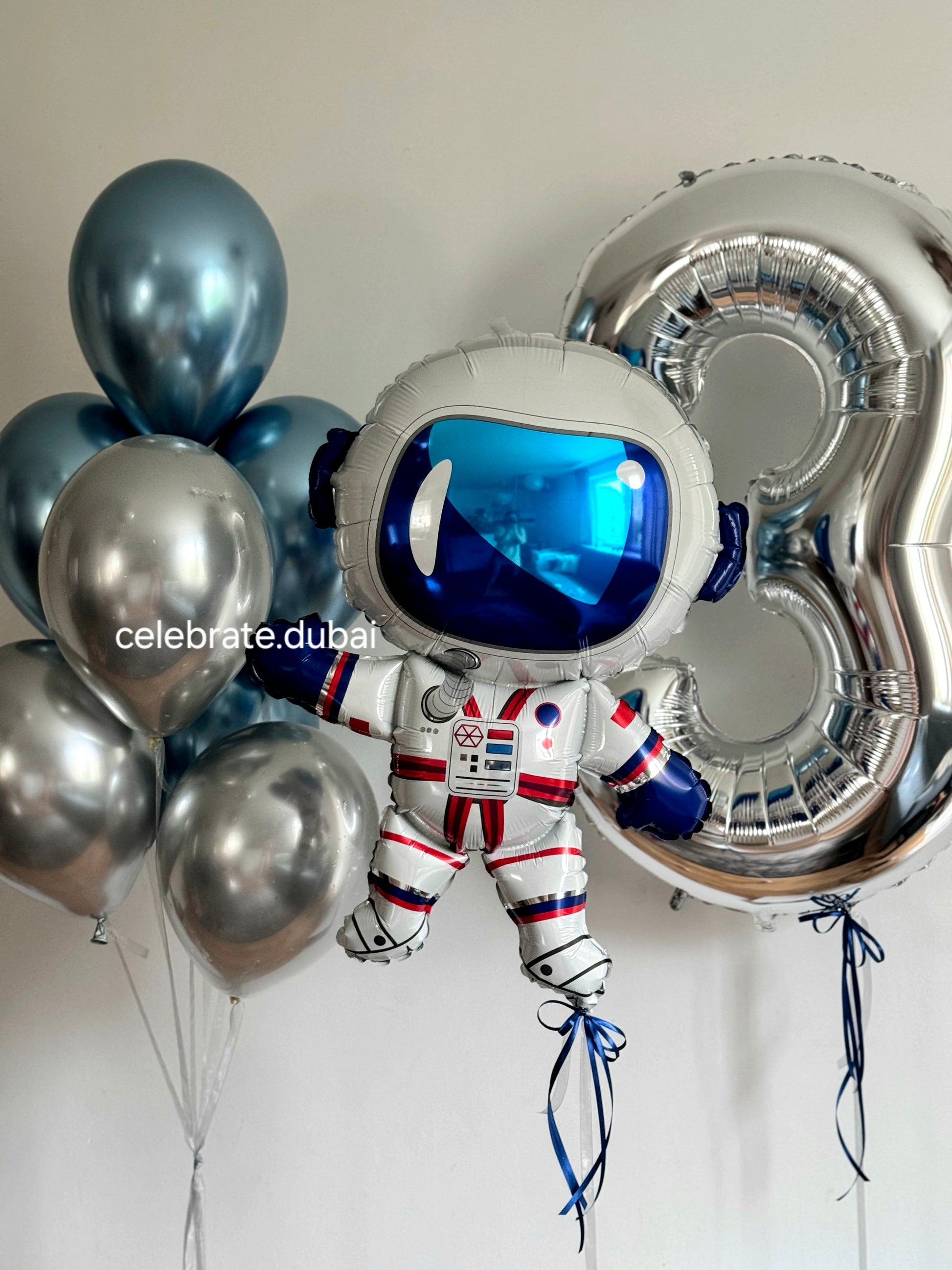 Kids_Helium_Balloon_Bouquet_Astronaut_Foil_Balloon_With_Number_Foil_Balloon_And_Blue_And_Silver_Chrome_Balloons